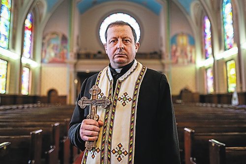 Daniel Crump / Winnipeg Free Press. Reverend Ihor Shved at the Ukrainian Catholic Metropolitan Cathedral of Sts. Volodymyr and Olha. March 5, 2022.