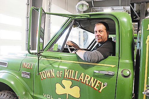 Deputy fire chief Sean Phillips gets behind the wheel of a modified 1967 GMC 960 truck on Wednesday evening. Although this vehicle originally served as a pumper truck for the Killarney-Turtle Mountain Fire Department, it was converted into a water tanker in the early 2000s. (Kyle Darbyson/The Brandon Sun)