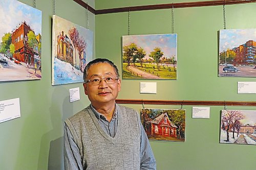 Local painter Weiming Zhao poses for a photo at the Daly House Museum on Thursday, less than 24 hours before his new exhibition, titled &quot;Brandon Heritage en Plein Air,&quot; will be opened to the public. This solo show marks the first time that Zhao has put his work on display since the COVID-19 pandemic began. (Kyle Darbyson/The Brandon Sun)