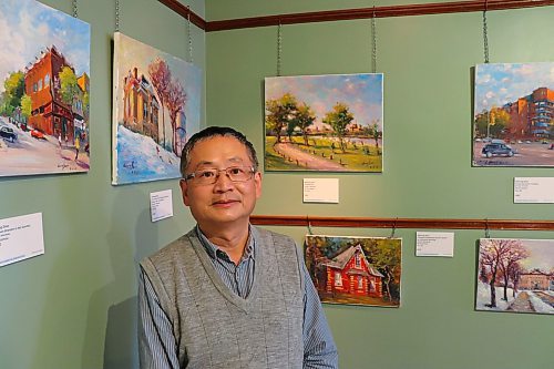 Local painter Weiming Zhao poses for a photo at the Daly House Museum on Thursday, less than 24 hours before his new exhibition, titled &quot;Brandon Heritage en Plein Air,&quot; will be opened to the public. This solo show marks the first time that Zhao has put his work on display since the COVID-19 pandemic began. (Kyle Darbyson/The Brandon Sun)