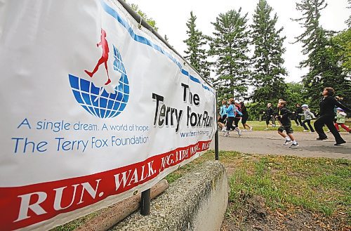 Brandon Sun Participants warm up for the 31st annual Terry Fox Run held at the Assiniboine Community College North Hill Campus during the fundraiser event on Sunday morning. (Bruce Bumstead/Brandon Sun)