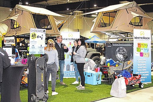 The display for Universal Truck Accessories at the Brandon Home and Leisure Show featured many outdoor adventure tools and acessories to make the next camping adventure fun and comfortable, including roof tent sstems, coolers and hitch-mounted barbecues. (Karen McKinley/Brandon Sun photo)