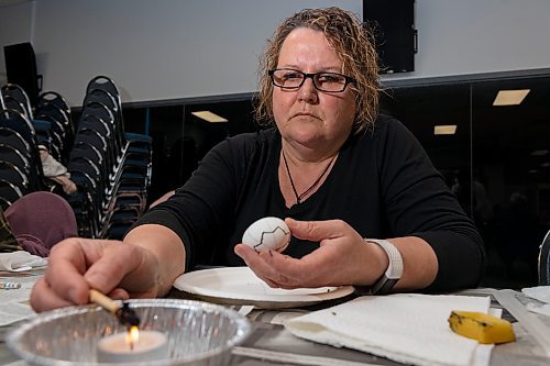Brenda Gould warms bee&#x573; wax for egg decorating during a pysanky workshop Saturday at the Souris-Glenwood Memorial Complex. (Chelsea Kemp/The Brandon Sun)