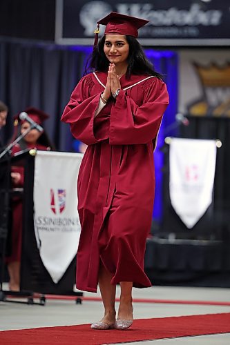 Ravneet Kaur reacts as she walks up to receive her certificate during Assiniboine Community College’s 2022 graduation ceremony at Westoba Place Friday. (Tim Smith/The Brandon Sun)