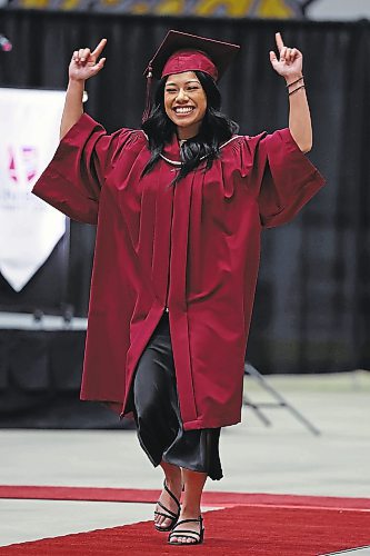 Brandon Sun 03062022

Jenica Joy Madrid celebrates while walking up to receive her diploma in Practical Nursing during Assiniboine Community College&#x2019;s 2022 graduation ceremony at Westoba Place on Friday. 

(Tim Smith/The Brandon Sun)