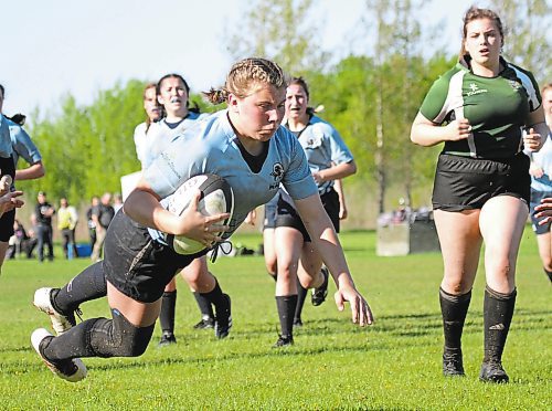 Rivers Rams Brooklyn Zemliak dives for a try during the Westman High School Rugby girls final against the Dauphin Clippers in Rivers on Friday. (Thomas Friesen/The Brandon Sun)