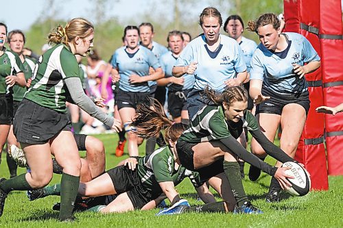 Dauphin Clippers Madisson Garton touches the ball down for a try against the Rivers Rams during the Westman High School Rugby girls final in Rivers on Friday. (Thomas Friesen/The Brandon Sun)