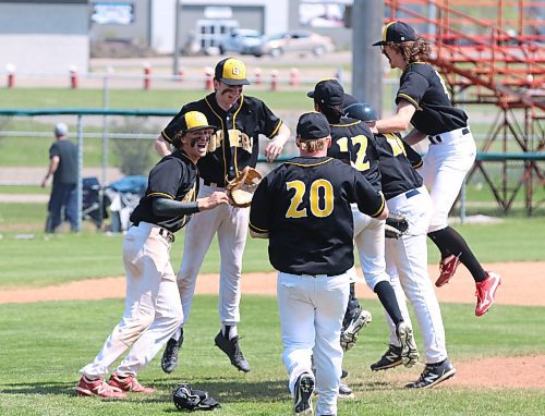 Members of the Garden City Fighting Gophers  celebrate after they beat the Stonewall Rams in the provincial high school baseball final at Brandon’s Andrews Field on Saturday. (Perry Bergson/The Brandon Sun)