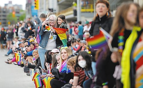 JOHN WOODS / WINNIPEG FREE PRESS
Melissa Peterson and daughter Ellie take part in the Pride Parade in downtown Winnipeg Sunday, June 5, 2022. 

Re: gabby