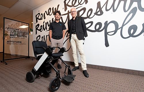 ETHAN CAIRNS / WINNIPEG FREE PRESS

CEO of WHILL Sugie Satoshi and CEO of Scootaround Personal Transportation Solutions Kerry Renaud stand behind a product from WHILL Inc in their office after a merger last year in Winnipeg on Wednesday on July 27, 2022.