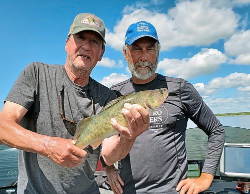 Don Lamont / Winnipeg Free Press
Don Lamont, left, with guide Ralph Scott and a walleye caught out of the Souris River. 