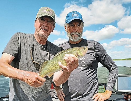 Don Lamont / Winnipeg Free Press
Don Lamont, left, with his friend and fellow angler Ralph Scott and a walleye caught out of the Souris River. 