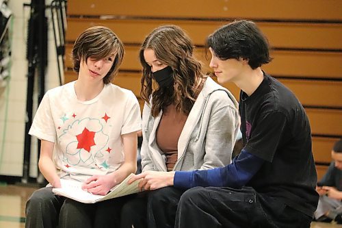 Aaron Cox (Vlad), Avery Simard (Anya) and Cohen Jago (Dmitry) prepare for their roles as the three leads of “Anastasia: The Musical” by performing the song "Learn to Do It" at the École secondaire Neelin High School gymnasium Friday. (Kyle Darbyson/The Brandon Sun)