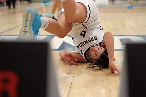 18112022
Chelsea Misskey #6 of the Brandon Bobcats tumbles to the floor after taking a shot on net during university women’s basketball action against the University of Lethbridge Pronghorns at the BU Healthy Living Centre on Friday evening. (Tim Smith/The Brandon Sun)