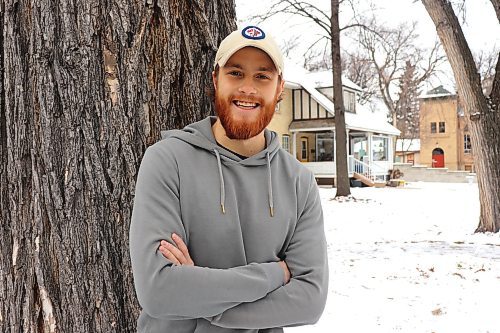 Director Alec Chambers poses for a photo outside his producer's house Friday afternoon in Brandon. Chambers is getting ready to premiere his debut feature film, "Whispers in the Wheat," at the Evans Theatre Dec. 9. (Kyle Darbyson/The Brandon Sun) 