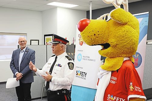 21112022
Brandon Police Service Inspector Marc Alain speaks during the kickoff for the Operation Red Nose annual safe rides home campaign at the CAA Manitoba office on 18th Street North on Monday. 
(Tim Smith/The Brandon Sun)