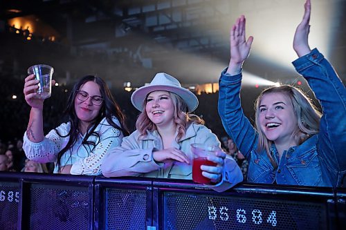 Fans cheer as Lonestar performs at Westoba Place Tuesday evening. (Tim Smith/The Brandon Sun)