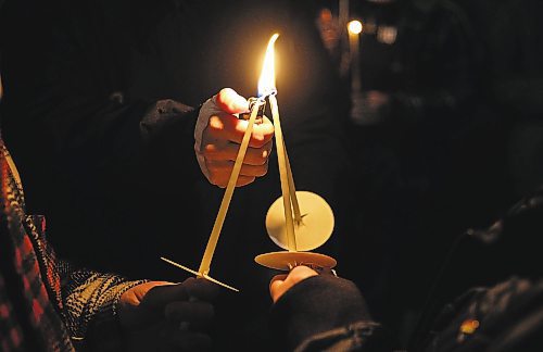 JESSICA LEE / WINNIPEG FREE PRESS

Dozens of attendees lit candles outside of Club 200 on November 24, 2022 to honour the lives of the victims of the Club Q tragedy in Colorado.

Stand up