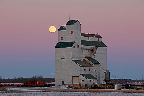 07122022
December's full moon, known as the cold moon, long night moon, or moon before Yule, rises to the northeast behind the Harte elevator in western Manitoba on a crisp and clear late Wednesday afternoon.  (Tim Smith/The Brandon Sun)