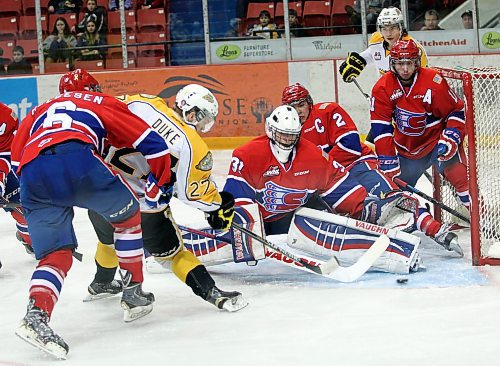 The Spokane Chiefs have the edge in the series with the Brandon Wheat Kings in the last 26 years in what&#x2019;s become a spirited rivalry between the clubs. In this photo from Feb. 13, 2015, Reid Duke (27) of the Brandon Wheat Kings scores on netminder Tyson Verhelst (31) of Brandon in a sea of red jerseys. (Tim Smith/ Brandon Sun)