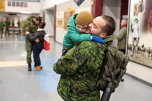 08122022
Cpl Michael Lesperance hugs his son Maverick, three, after arriving back to CFB Shilo from Latvia late Thursday night along with fellow troops from 2PPCLI and the 1st Regiment, Royal Canadian Horse Artillery following a six month deployment as part of Operation Reassurance. Over 500 troops have been returning home from Shilo over the past few weeks with approximately 120 arriving home Thursday. Other troops from Shilo deployed to Latvia in recent days as part of the ongoing operation. 
(Tim Smith/The Brandon Sun)