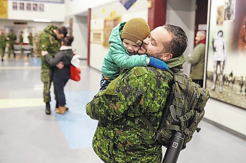 08122022
Cpl Michael Lesperance hugs his son Maverick, three, after arriving back to CFB Shilo from Latvia late Thursday night along with fellow troops from 2PPCLI and the 1st Regiment, Royal Canadian Horse Artillery following a six month deployment as part of Operation Reassurance. Over 500 troops have been returning home from Shilo over the past few weeks with approximately 120 arriving home Thursday. Other troops from Shilo deployed to Latvia in recent days as part of the ongoing operation. 
(Tim Smith/The Brandon Sun)