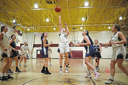 09122022
Beth Wilson #13 of the Neelin Spartans leaps for a shot on the net during their Crocus Plains Early Bird varsity girls basketball tournament match against the Swan River Tigers at Crocus Plains Regional Secondary School on Friday. (Tim Smith/The Brandon Sun)