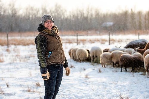 MIKAELA MACKENZIE / WINNIPEG FREE PRESS

Anna Hunter, co-director of Pembina Fibreshed, poses for a portrait with her flock of wool sheep at her fibre farm east of Winnipeg on Tuesday, Dec. 6, 2022. For green page story.
Winnipeg Free Press 2022.