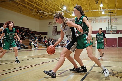 09122022
Jessie Sumner #8 of the Vincent Massey Vikings tries to maneuver around Jaxen Furkalo #4 of the Dauphin Clippers during their Crocus Plains Early Bird varsity girls basketball tournament match at Crocus Plains Regional Secondary School on Friday. (Tim Smith/The Brandon Sun)
