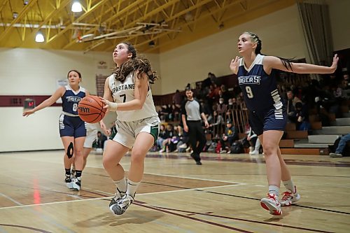 09122022
Karla Vlok #7 of the Neelin Spartans sets up for a shot on the net during their Crocus Plains Early Bird varsity girls basketball tournament match against the Swan River Tigers at Crocus Plains Regional Secondary School on Friday. (Tim Smith/The Brandon Sun)
