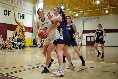09122022
Siena McMillan #8 of the Neelin Spartans looks for an opening to take a shot on the net during the Spartans&#x2019; Crocus Plains Early Bird varsity girls basketball tournament match against the Swan River Tigers at Crocus Plains Regional Secondary School on Friday. (Tim Smith/The Brandon Sun)