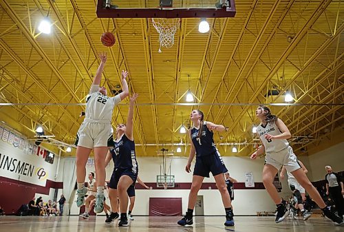 09122022
Danica Black #22 of the Neelin Spartans leaps for a shot on the net during their Crocus Plains Early Bird varsity girls basketball tournament match against the Swan River Tigers at Crocus Plains Regional Secondary School on Friday. (Tim Smith/The Brandon Sun)