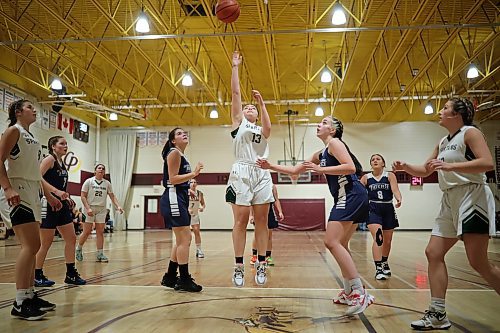 09122022
Beth Wilson #13 of the Neelin Spartans leaps for a shot on the net during their Crocus Plains Early Bird varsity girls basketball tournament match against the Swan River Tigers at Crocus Plains Regional Secondary School on Friday. (Tim Smith/The Brandon Sun)