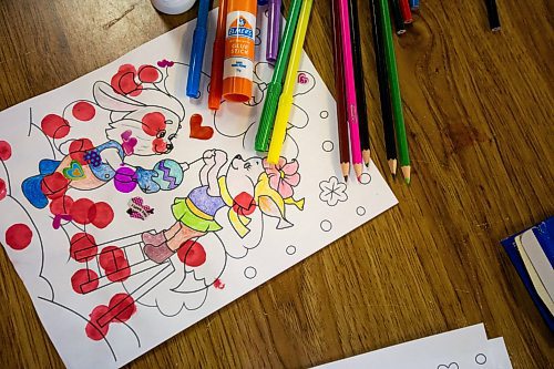 Daniel Crump / Winnipeg Free Press. A festive Christmas scene coloured by a youngster at a Christmas event for recently arrived Ukrainian kids at Oseredok Ukrainian Cultural and Educational Centre. December 10, 2022.