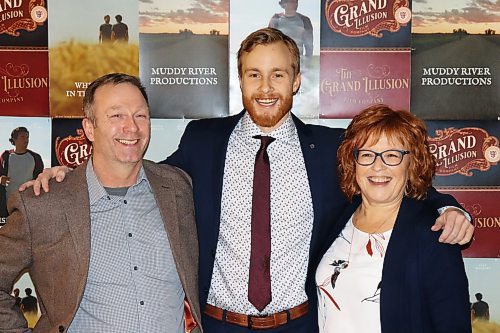 Brandon-based filmmaker Alec Chambers poses for a photo with his parents Kevin and Kim at the world premiere of his debut feature film, which took place at the Evans Theatre Friday evening. Chambers shot this film, &#x201c;Whispers in the Wheat,&#x201d; over two years ago and is finally getting the opportunity to watch it with an audience. (Kyle Darbyson/The Brandon Sun)