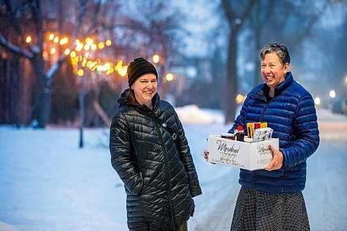 MIKAELA MACKENZIE / WINNIPEG FREE PRESS

Mel Bowman Wilson (left) and Grace Sheppard, co-organizers for the third Wolseley hamper program, pose for a photo in Winnipeg on Friday, Dec. 9, 2022. For Malak Abas story.
Winnipeg Free Press 2022.