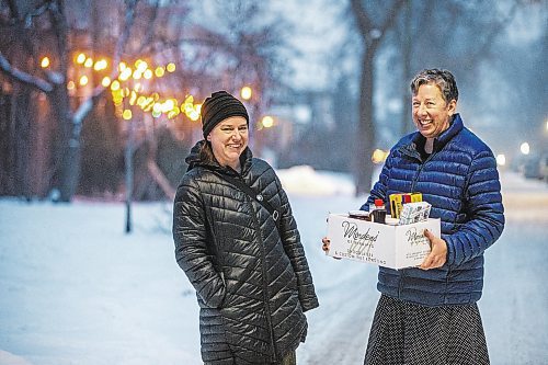 MIKAELA MACKENZIE / WINNIPEG FREE PRESS

Mel Bowman Wilson (left) and Grace Sheppard, co-organizers for the third Wolseley hamper program, pose for a photo in Winnipeg on Friday, Dec. 9, 2022. For Malak Abas story.
Winnipeg Free Press 2022.