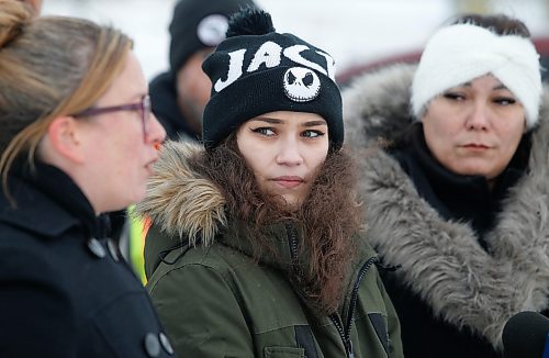 JOHN WOODS / WINNIPEG FREE PRESS
Kirstin Witwicki, cousin of Morgan Harris, left, Cambria Harris, daughter of Morgan Harris, centre and Melissa Normand, cousin of Morgan Harris, right, talk to media as friends and family of MMIWG close down Brady Road and the entrance to the Brady Road landfill Sunday, December 11, 2022. The group is calling the closure of the landfill so that it can be searched for missing people.

Re: kitching