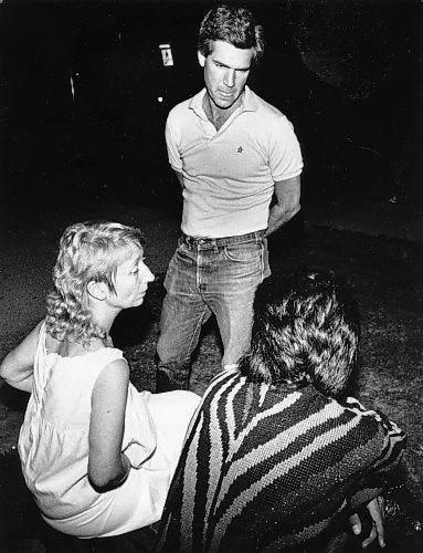 Liberal MLA Jim Carr (standing) on a midnight tour to survey the situation on streets around the Legislative Building after dark in August 1988.  (Phil Hossack / Winnipeg Free Press files)