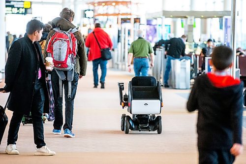 MIKAELA MACKENZIE / WINNIPEG FREE PRESS
The new self-driving wheelchairs, developed by Winnipeg mobility equipment company Scootaround and Japanese firm WHILL Inc., are the first of their kind to be used in a North America
airport.