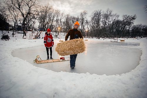 JOHN WOODS / WINNIPEG FREE PRESS
Eric Reder and his son North, 14, get their skating rinks on the Seine River ready for the winter season Monday, December 12, 2022. The pair is having a get together for North’s hockey team later this week.

Re: rachel