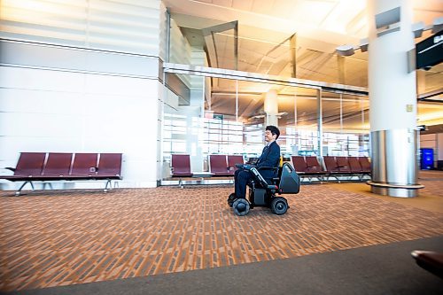 MIKAELA MACKENZIE / WINNIPEG FREE PRESS

Yuta Okumura, director of autonomous program implementation at Scootaround / WHILL demonstrates the new self-driving wheelchairs (the first of their kind in North America) at the Winnipeg James Armstrong Richardson International Airport in Winnipeg on Tuesday, Dec. 13, 2022. For Marty Cash story.
Winnipeg Free Press 2022.