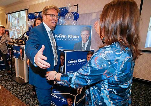 Progressive Conservative candidate Kevin Klein is congratulated by Premier Heather Stefanson after winning the Kirkfield Park byelection on Tuesday evening. (Winnipeg Free Press)