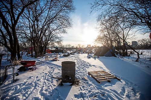 MIKAELA MACKENZIE / WINNIPEG FREE PRESS

An encampment, where a fire recently burned down one of the tents, on Higgins in Winnipeg on Monday, Dec. 5, 2022. For Katie May story.
Winnipeg Free Press 2022.