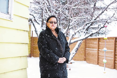 MIKAELA MACKENZIE / WINNIPEG FREE PRESS

Alison Cox, who was triaged with her husband in a cold hospital garage last night with pneumonia, poses for a portrait outside of her home in Winnipeg on Wednesday, Dec. 14, 2022. For Malak story.
Winnipeg Free Press 2022.