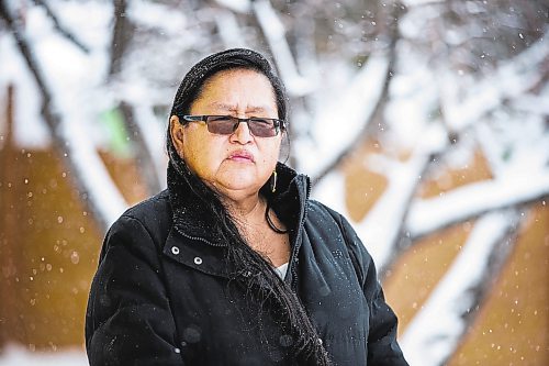 MIKAELA MACKENZIE / WINNIPEG FREE PRESS

Alison Cox, who was triaged with her husband in a cold hospital garage last night with pneumonia, poses for a portrait outside of her home in Winnipeg on Wednesday, Dec. 14, 2022. For Malak story.
Winnipeg Free Press 2022.