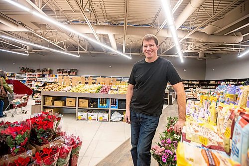 MIKAELA MACKENZIE / WINNIPEG FREE PRESS

Scott Schriemer, owner of Vic&#x2019;s Market, poses for a photo in the new store location in Winnipeg on Tuesday, Dec. 13, 2022. For Dave Sanderson story.
Winnipeg Free Press 2022.