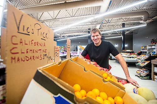 MIKAELA MACKENZIE / WINNIPEG FREE PRESS

Scott Schriemer, owner of Vic&#x2019;s Market, poses for a photo in the new store location in Winnipeg on Tuesday, Dec. 13, 2022. For Dave Sanderson story.
Winnipeg Free Press 2022.