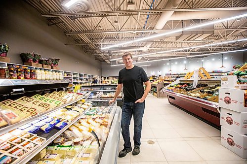 MIKAELA MACKENZIE / WINNIPEG FREE PRESS

Scott Schriemer, owner of Vic&#x2019;s Market, poses for a photo in the new store location in Winnipeg on Tuesday, Dec. 13, 2022. For Dave Sanderson story.
Winnipeg Free Press 2022.