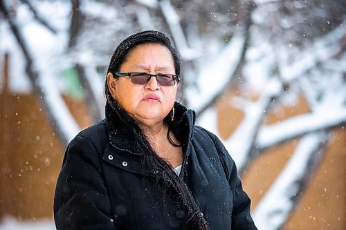 MIKAELA MACKENZIE / WINNIPEG FREE PRESS

Alison Cox, who was triaged with her husband in a cold hospital garage last night with pneumonia, poses for a portrait outside of her home in Winnipeg on Wednesday, Dec. 14, 2022. For Malak story.
Winnipeg Free Press 2022.